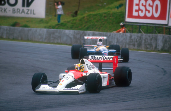 Mansell chasing Senna