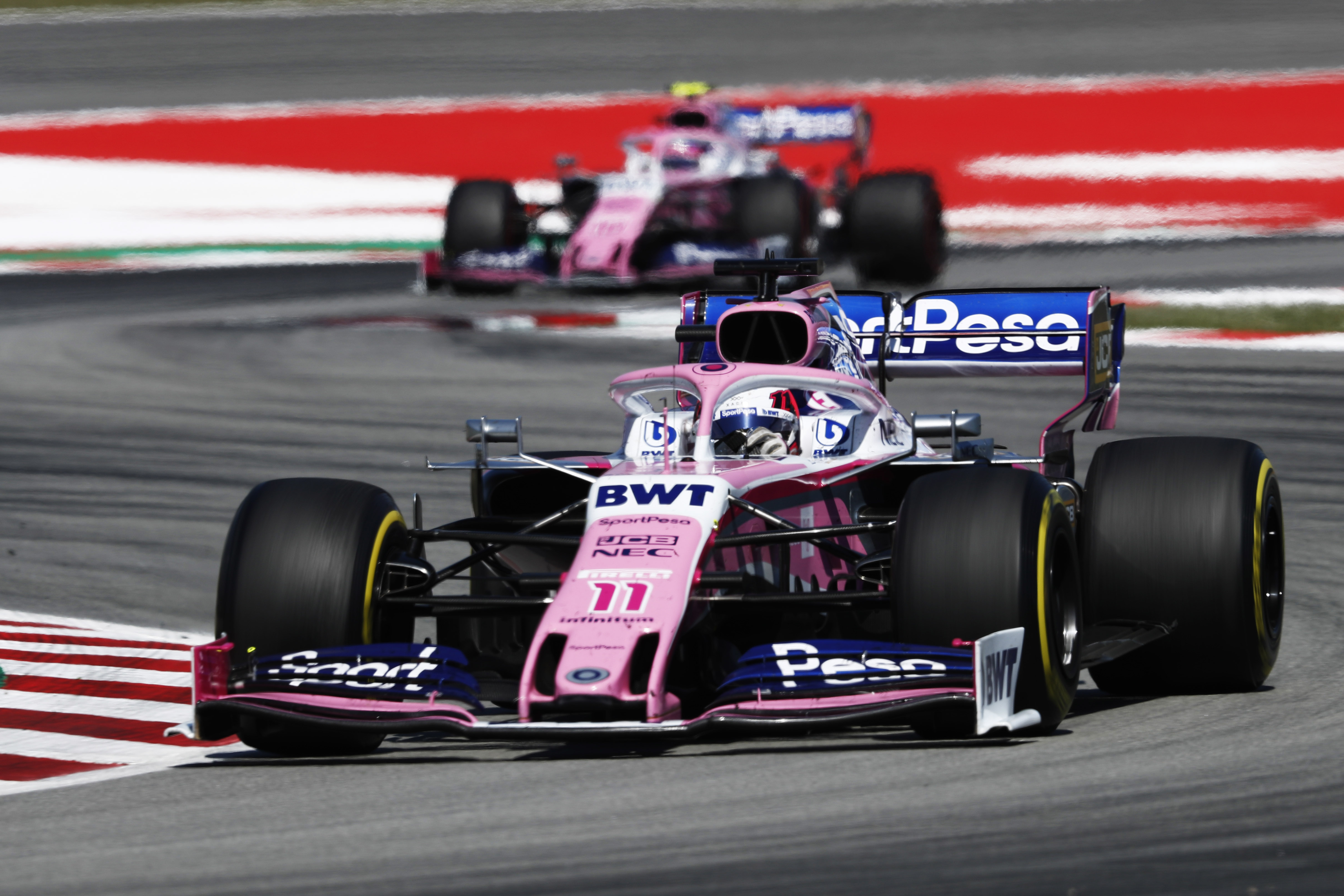 Sergio Perez, Racing Point RP19, leads Lance Stroll, Racing Point RP19